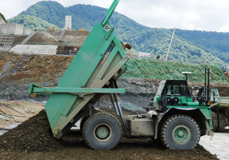 Automated dump truck