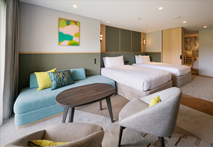 図版：シックなインテリアに統一されたゲストルーム