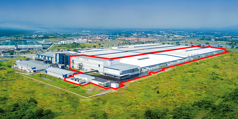 完成した新工場棟（赤枠が新工場棟）